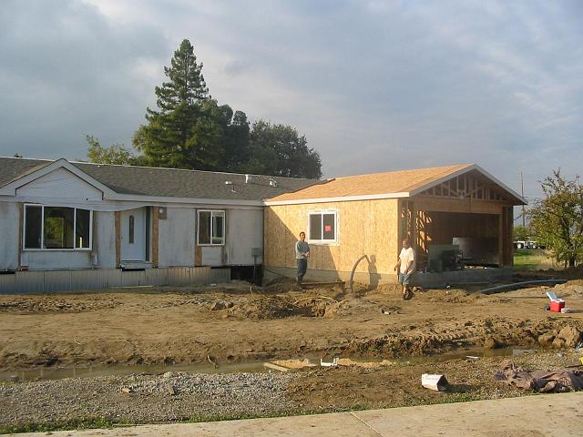 Stucco 4 The site-built attached garages will also get the same finish.